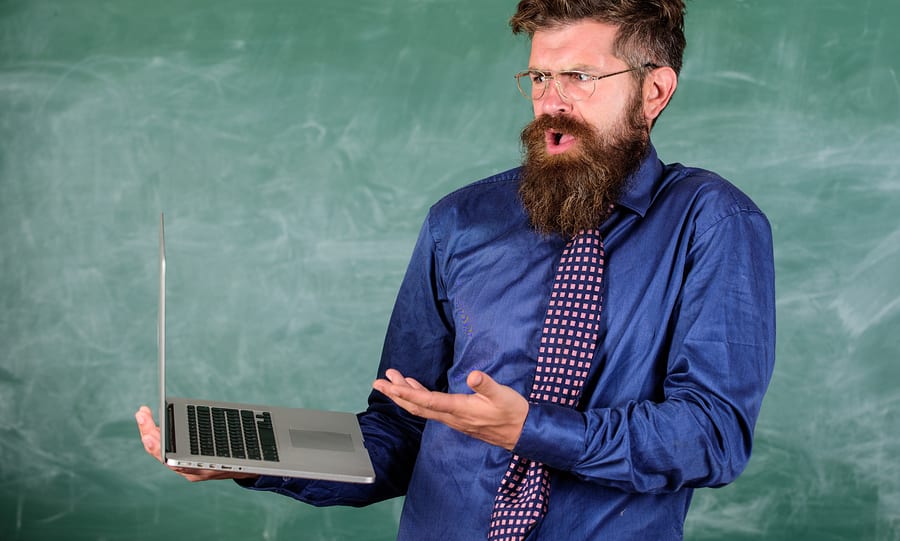 Man looking at computer, confused about cyber security best practices